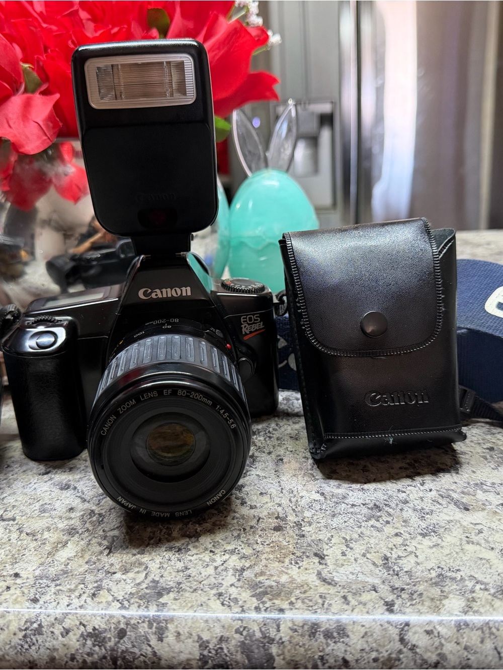 Canon Black DSLR Camera with External Flash and Lens